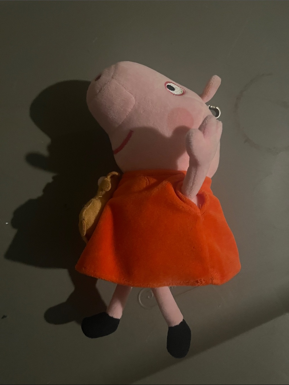 Plush Pink Piglet Keychain with Bright Orange Dress